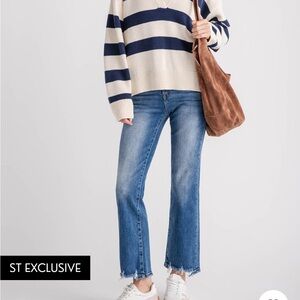 Risen High Rise Step Hem Jeans